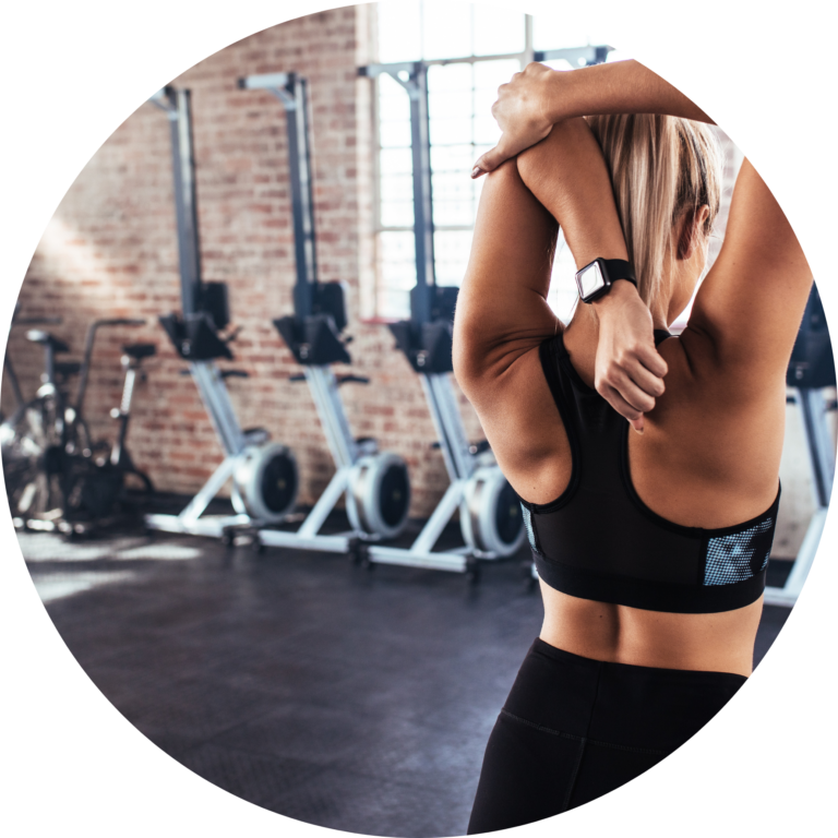 woman-stretching-in-gym